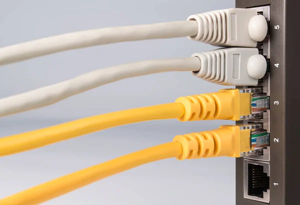 Close Part Network Equipment White Background Connected Colored Ethernet Cables — Stock Photo, Image