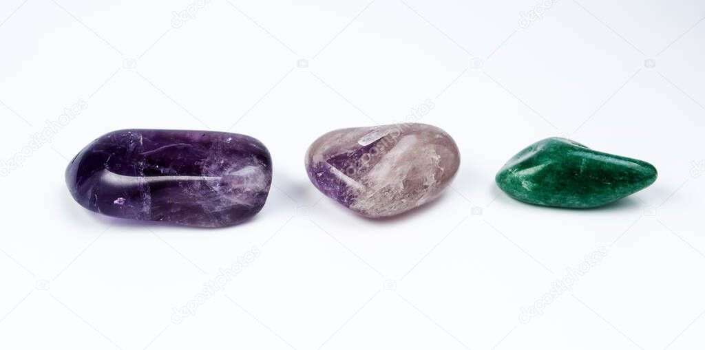 different colorful Semi Precious stones on white background