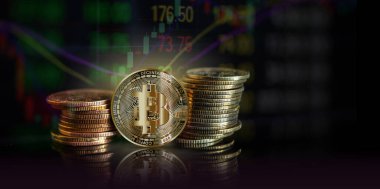 Kripto para birimini temsil eden altın sikkeler arka planda mevcut eğilimleri ve analizleri gösteren pazar verileriyle belirgin bir şekilde gösterilir.