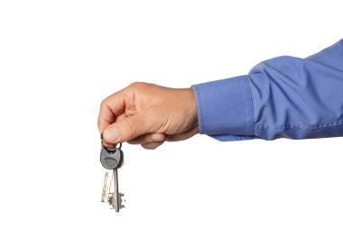 Heyecanlı bireyler yeni evlerinin anahtarlarına sahipler ve bu da ev sahibi olarak yolculuklarının başlangıcı..