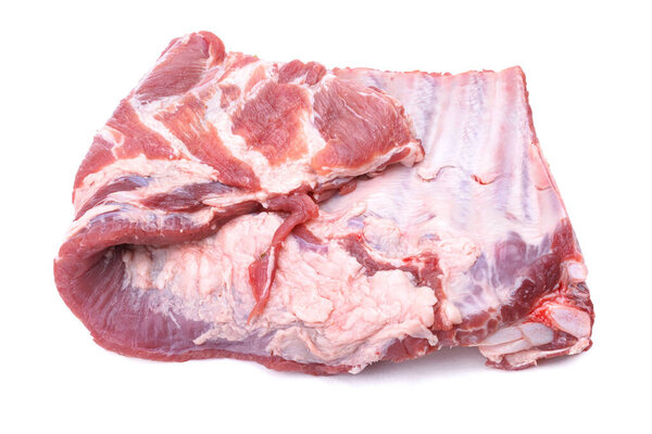 Raw pork ribs are isolated on a white background.Selective focus.