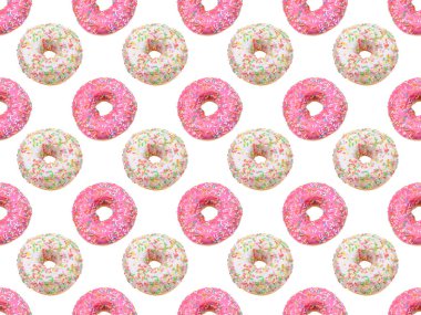 Kusursuz desenli. Parlak renkli serpiştirilmiş donutlar, beyaz arka planda izole edilmiş.