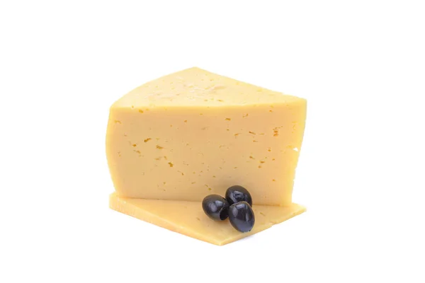 Solid yellow gouda cheese, close-up, isolated on a white background.selective focus. — Stock Photo, Image