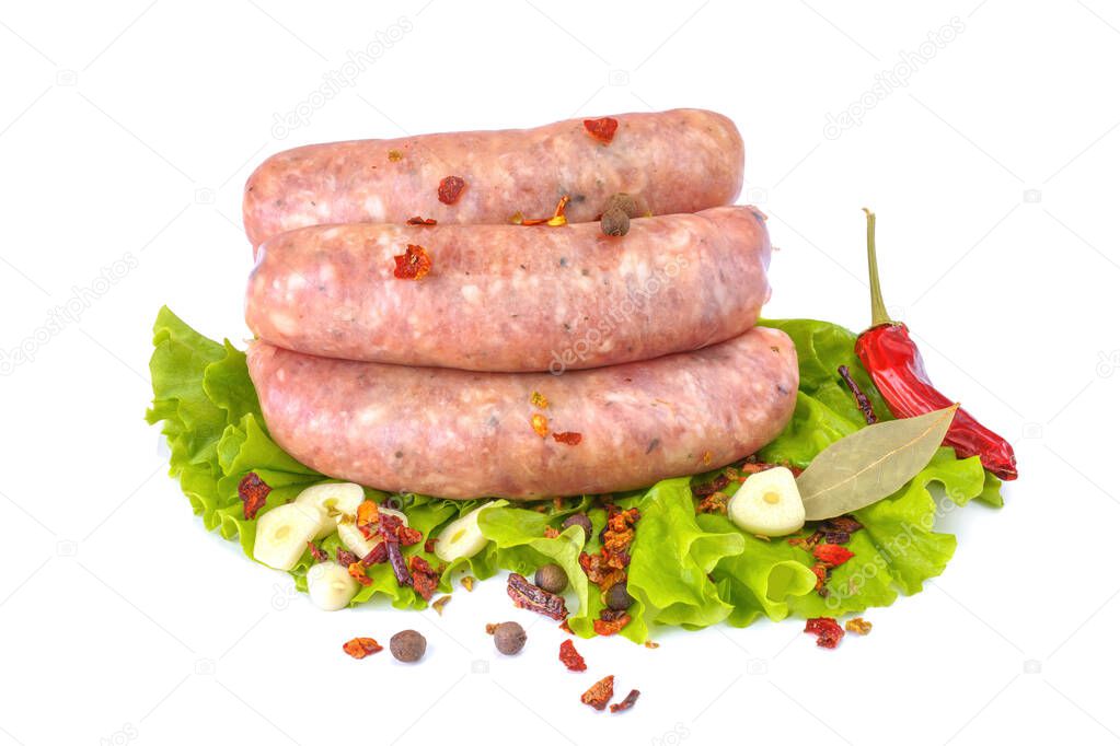 Raw pork sausages.Grilled sausages in close-up, isolated on a white background.Selective focus.Horizontal view.