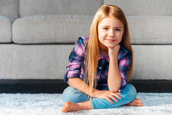 Cheerful little girl looking at camera — Stock Photo, Image
