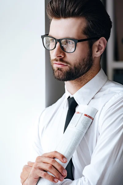 Pensive young businessman in glasses — Stock Photo, Image