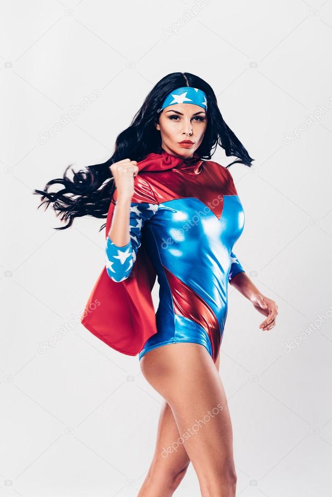 young woman in superhero costume