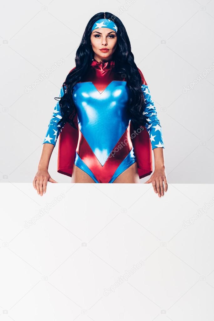 young woman in superhero costume