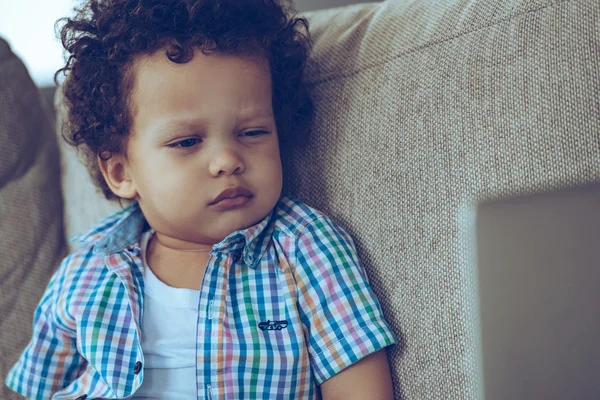 Baby boy with laptop at home — Stock Photo, Image