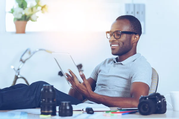 Man sitting at his working place — Stock Photo, Image