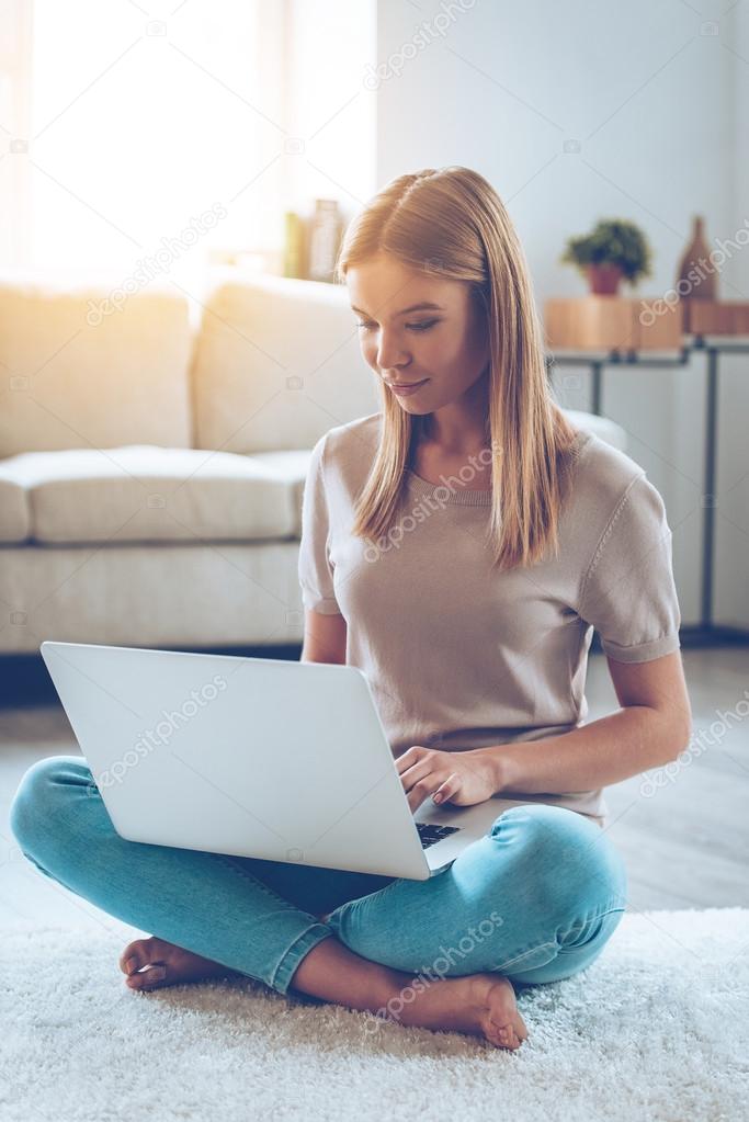 young woman using laptop 