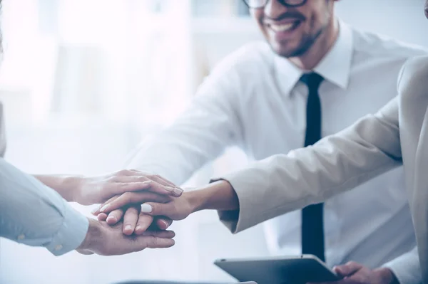 Young people holding hands — Stock Photo, Image