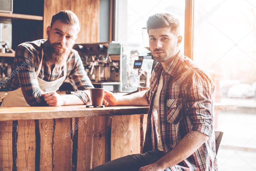  handsome men at bar counter