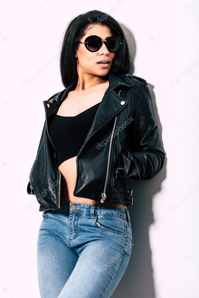 Beautiful young woman in leather jacket 