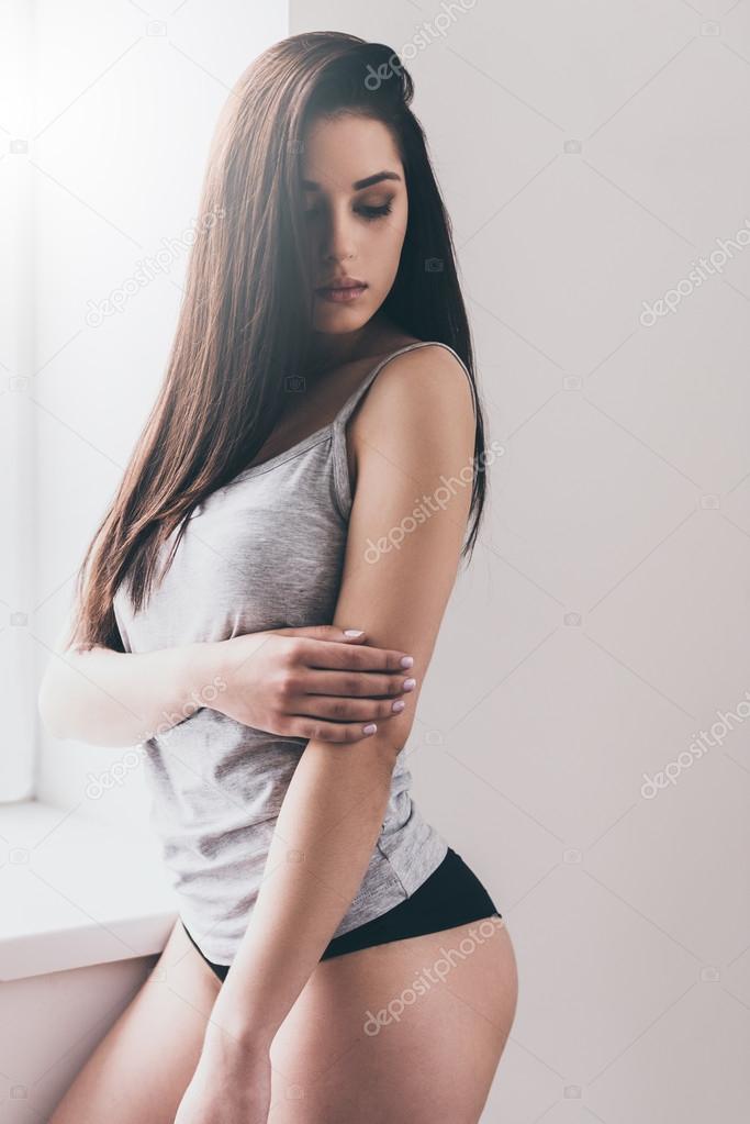 Beautiful woman in panties and top Stock Photo by ©gstockstudio