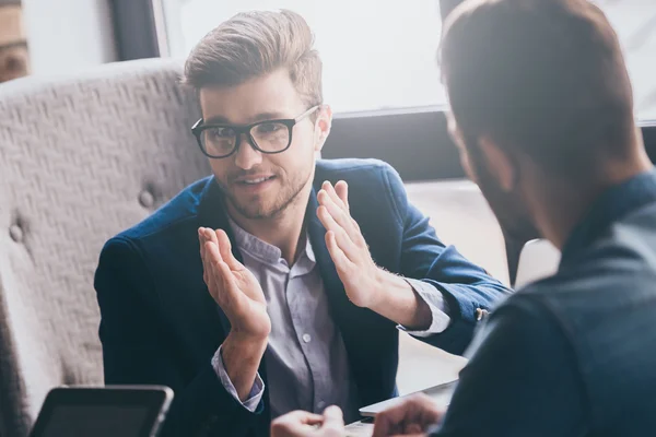 Team of workers discussing projects — Stock Photo, Image