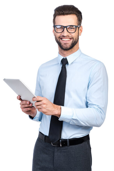 man in shirt and tie holding digital tablet