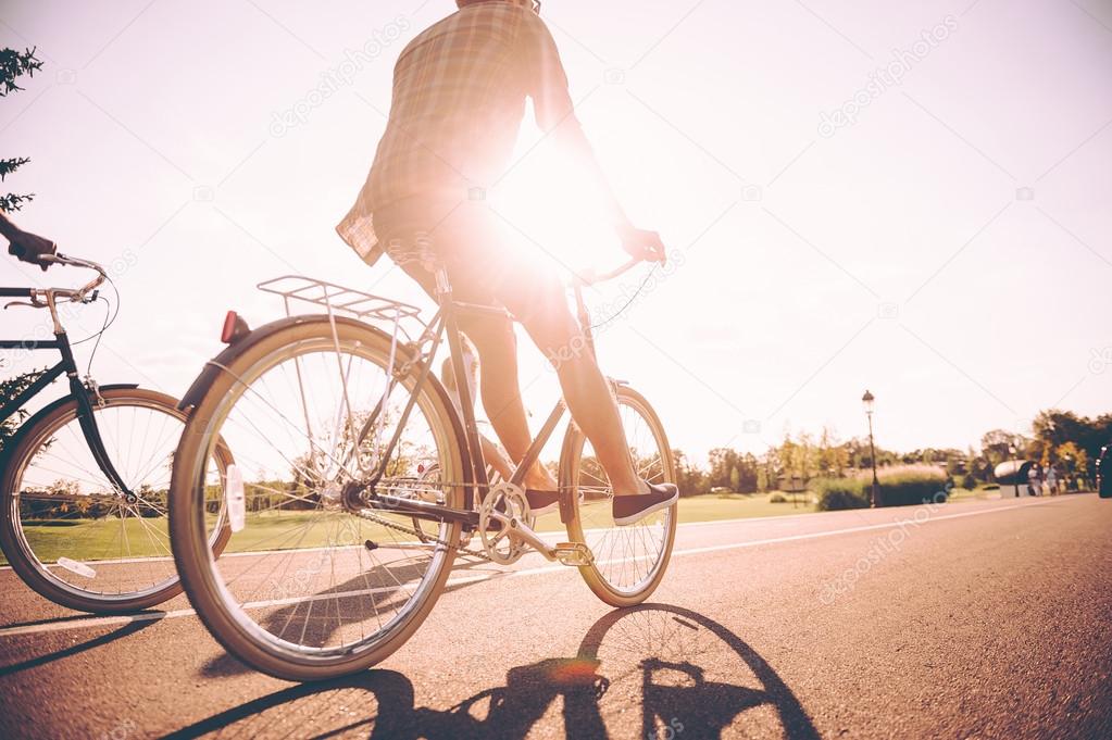 young man riding bicycle 