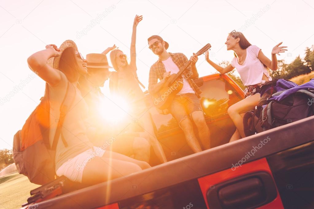 people dancing and playing guitar 
