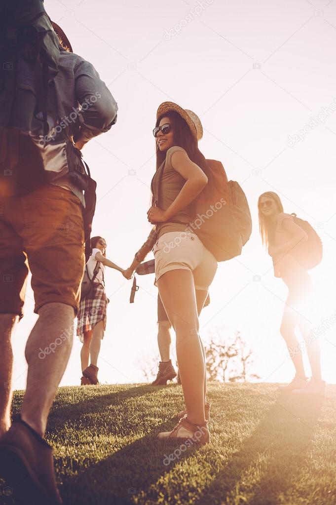 young people with backpacks 