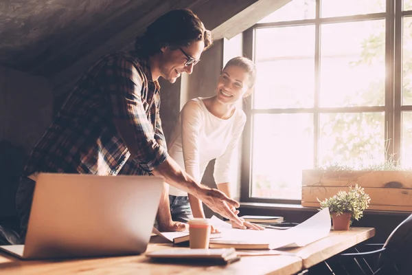 Man and woman   in creative office — Stock Photo, Image