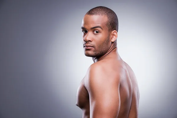 African man looking over shoulder — Stock Photo, Image