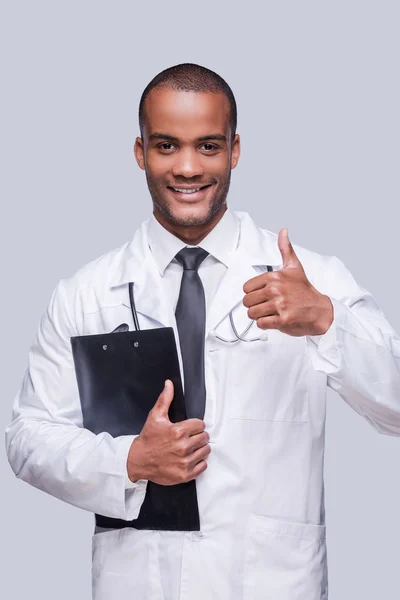 African doctor showing his thumb up — Stock Photo, Image