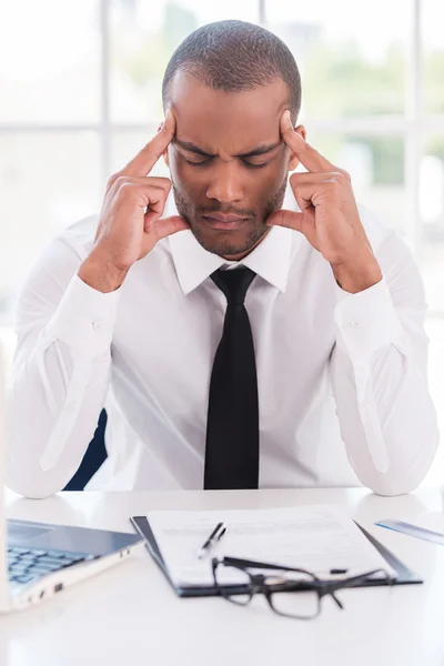 Depressed young African man in formalwear — Stock Photo, Image