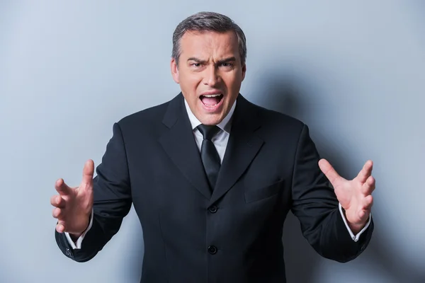 Furious mature man in formalwear — Stock Photo, Image