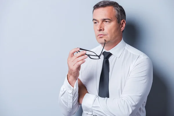 Thoughtful mature man in formalwear — Stock Photo, Image