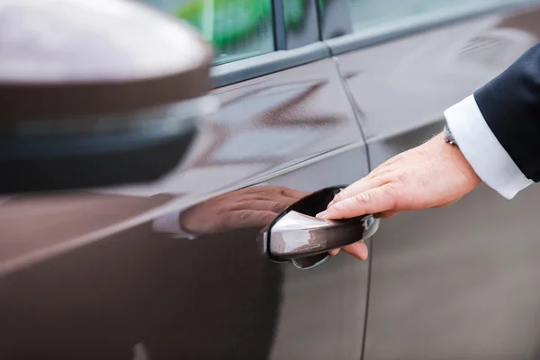 Hand on handle — Stock Photo, Image