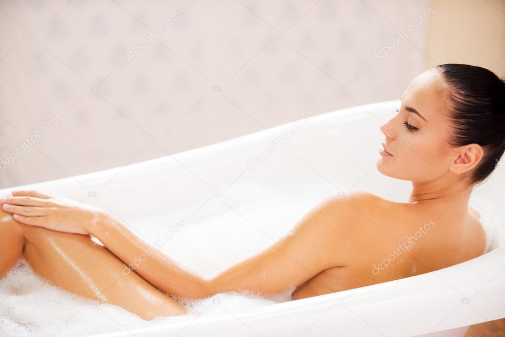 Woman enjoying bubble bath