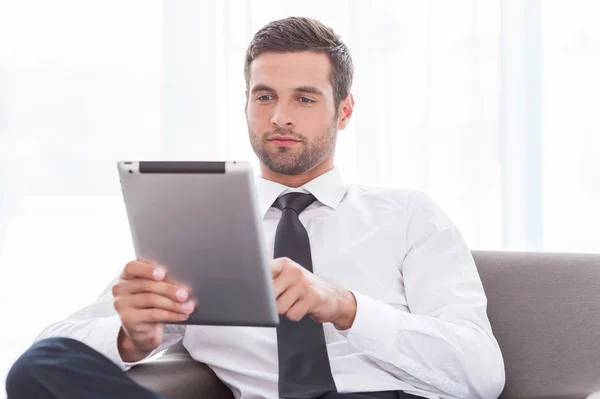 Businessman working on digital tablet Royalty Free Stock Images