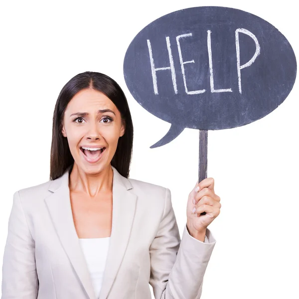 Woman in formalwear holding banner with help text — Stock Photo, Image