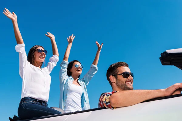 People in convertible — Stock Photo, Image