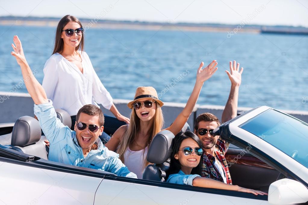 People enjoying road trip