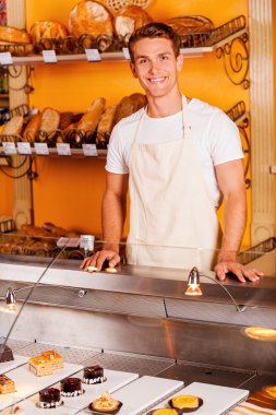 Man in bakery shop clipart