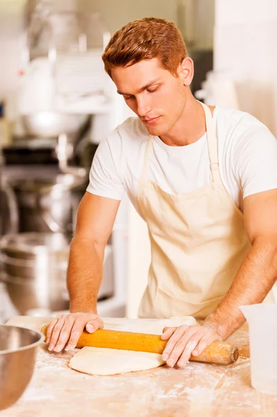 Rolling out dough — Stock Photo, Image