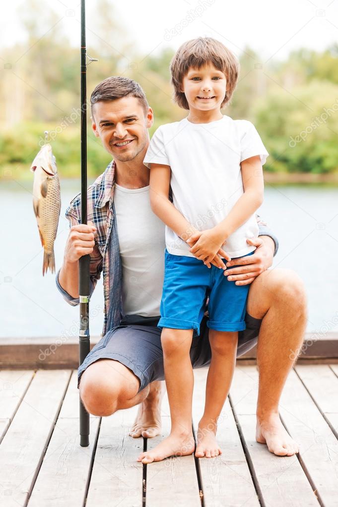 Father and son fishing Stock Photo by ©gstockstudio 54244631