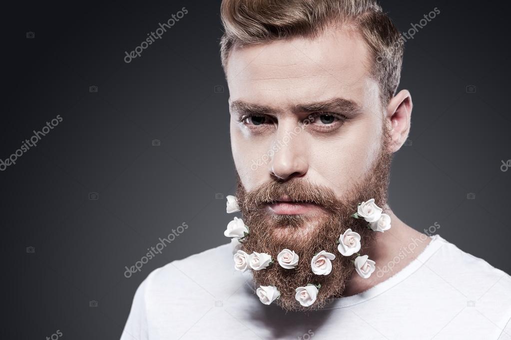 Man with flowers in his beard