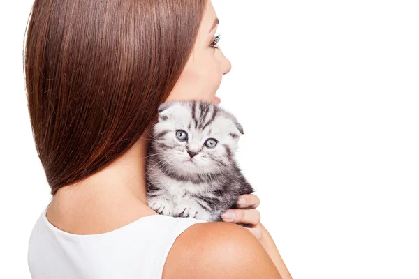 Woman carrying her little kitten on shoulder — Stock Photo, Image