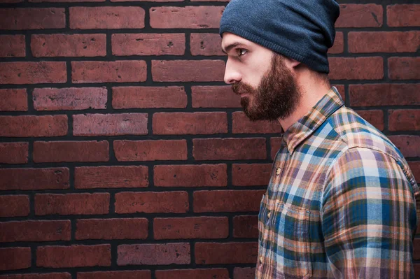 Side view of handsome young bearded man — Stock Photo, Image