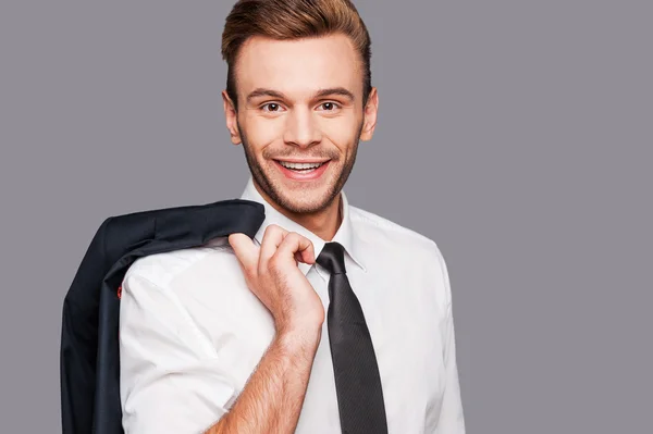 Man carrying his jacket on shoulders — Stock Photo, Image