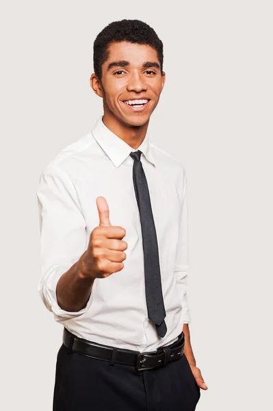 Afro-American man in formalwear stretching out hand with thumb up — Stock Photo, Image