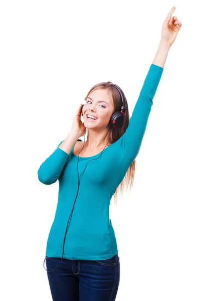 Woman standing in headphones — Stock Photo, Image