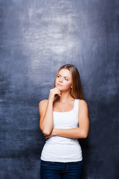 Woman holding hand on chin — Stock Photo, Image