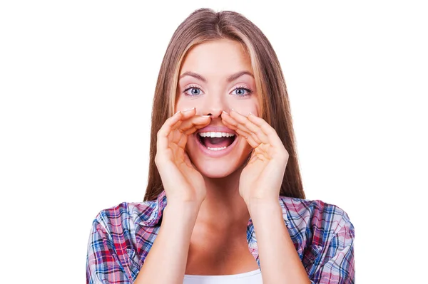 Woman shouting and holding hand near mouth — Stock Photo, Image