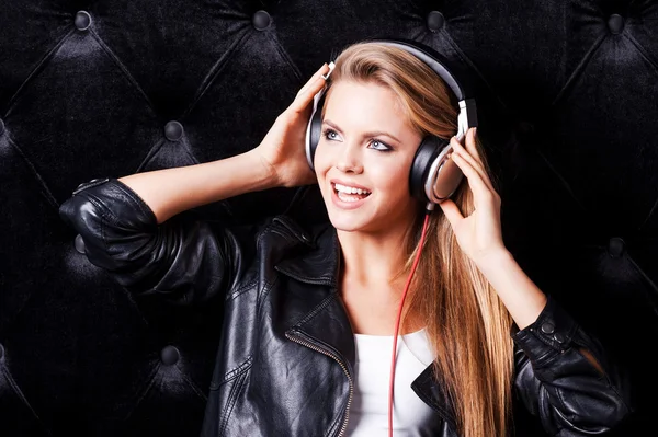 Woman with make up and in headphones — Stock Photo, Image