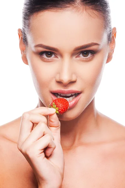 Shirtless woman holding strawberry — Stock Photo, Image