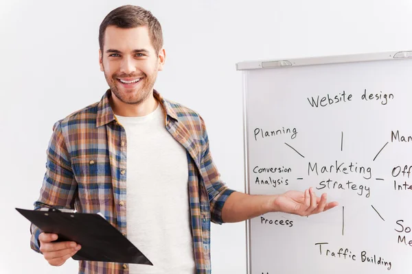 Young man talking about strategy. — Stock Photo, Image